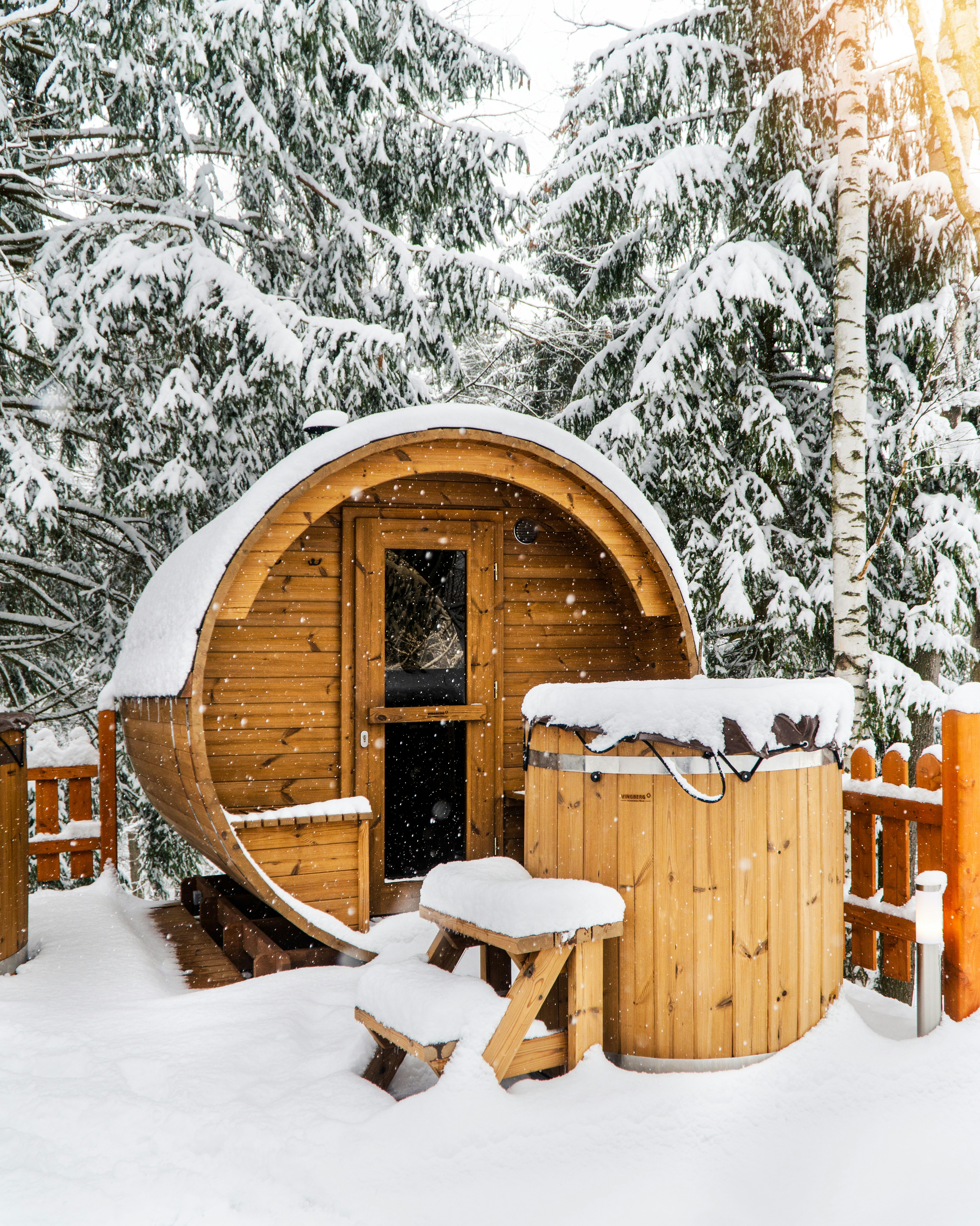 Barrel sauna in winter snow